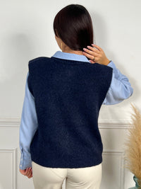 Gilet sans manches bleu marine femme
Gilet
Sans manches
Col rond
Boutons sur la longueur et les poches
Épaulettes&nbsp;
Couleur : bleu