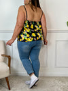 Ce top fluide grande taille allie confort et style avec son imprimé citron et jonquilles aux tons jaune et vert. Son col V féminin est souligné par de jolis boutons noirs factices. Les bretelles réglables s’adaptent à toutes les morphologies et l’élastique au dos assure un maintien parfait. Idéal pour apporter une touche fraîche et estivale à vos tenues.