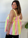 Ce top grande taille en gaze de coton offre un confort optimal avec son élastique au dos. Son col V à nouer et ses motifs verticaux fluos apportent style et fraîcheur, idéal pour une silhouette féminine et décontractée.