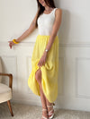 Rayonnante et ultra confortable, cette jupe longue en gaze de coton jaune illumine la silhouette avec douceur. Sa taille élastique s’adapte parfaitement à votre morphologie, pour un look à la fois fluide, léger et facile à vivre au quotidien.
