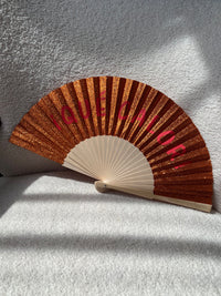 Éventail orange pailleté : Qué calor