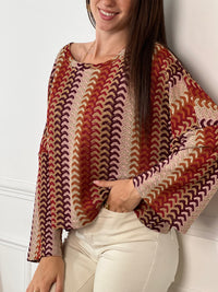 Apportez une touche de gaieté à votre garde-robe avec ce top en crochet Valentine. Conçu avec des manches longues et un col rond, il offre confort et élégance au quotidien. Sa couleur vive met en valeur votre silhouette tout en restant léger et agréable à porter.