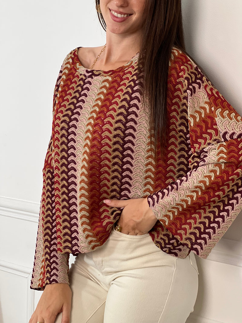 Apportez une touche de gaieté à votre garde-robe avec ce top en crochet Valentine. Conçu avec des manches longues et un col rond, il offre confort et élégance au quotidien. Sa couleur vive met en valeur votre silhouette tout en restant léger et agréable à porter.