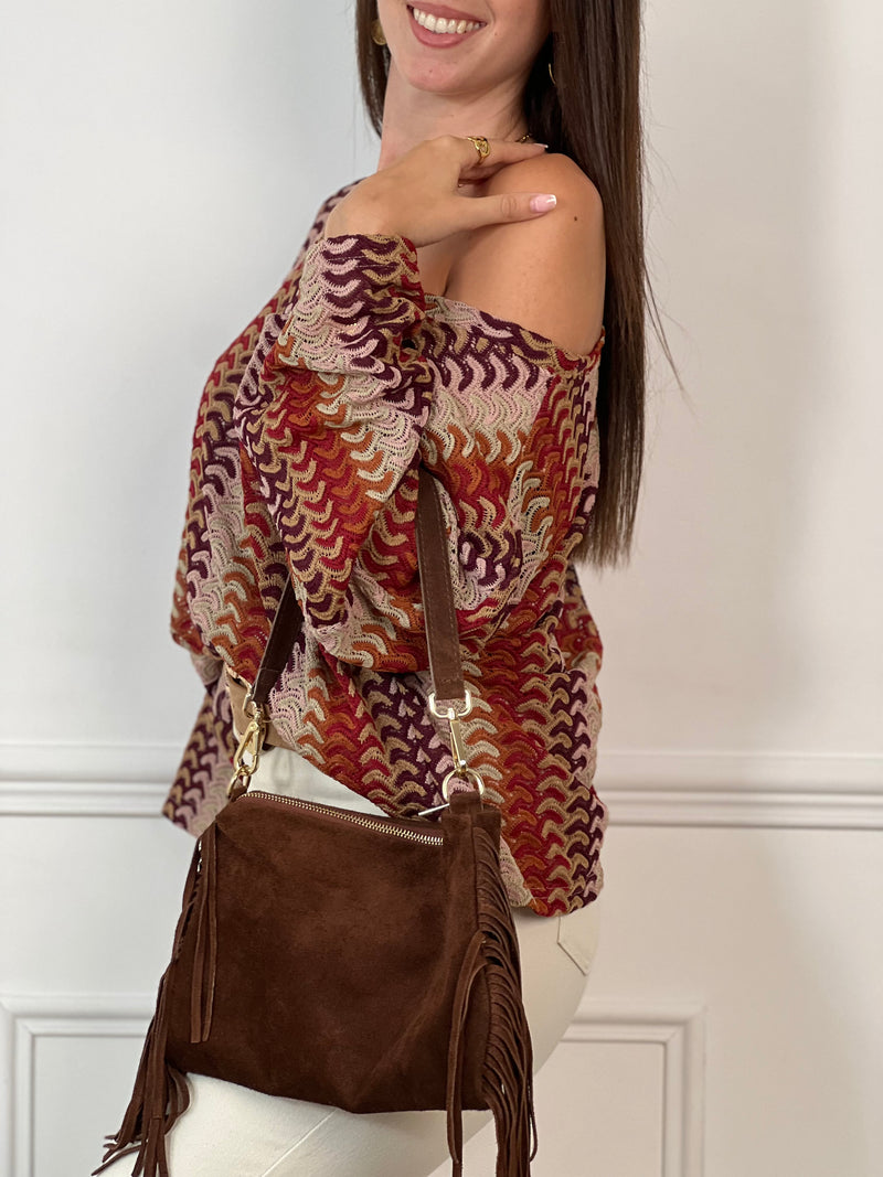 Apportez une touche de gaieté à votre garde-robe avec ce top en crochet Valentine. Conçu avec des manches longues et un col rond, il offre confort et élégance au quotidien. Sa couleur vive met en valeur votre silhouette tout en restant léger et agréable à porter.