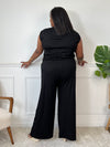 Découvrez l'ensemble noir grande taille Jazz, alliant confort et élégance. Le pantalon à taille élastique assure une tenue agréable toute la journée, tandis que le haut sans manches, orné d'un détail boucle dorée à l'épaule, apporte une touche raffinée.