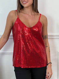 Faites resplendir votre garde-robe avec notre Top rouge à sequins Anycia ! Les bretelles réglables et le col V offrent un confort personnalisé, tandis que la doublure garantit un ajustement parfait. Les sequins rouges ajoutent une touche d'éclat à cette pièce incontournable qui vous fera briller de jour comme de nuit.