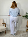 Ce pantalon écru grande taille Maloe est à la fois chic et décontracté. Fabriqué en gaze de coton, il est léger et confortable à porter toute la journée.