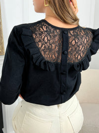 Pull noir en broderie Pull manches longues Col V Dos avec borderie, volants et boutons factices Couleur : noir Composition : 50%Viscose, 30% Polyester, 20% Polyamide Lavage à la main obligatoire