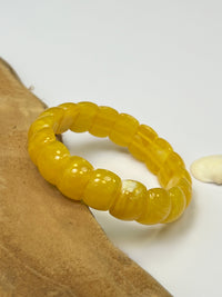 Yellow bracelet: Maya