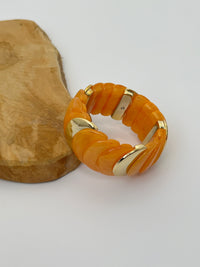 Orange bracelet: Rolla