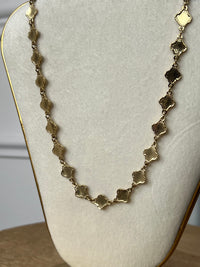 Gold necklace: Baena