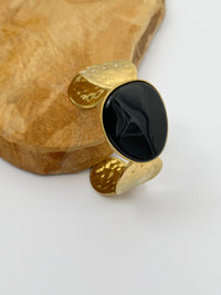 Gold and black bracelet: Julio
