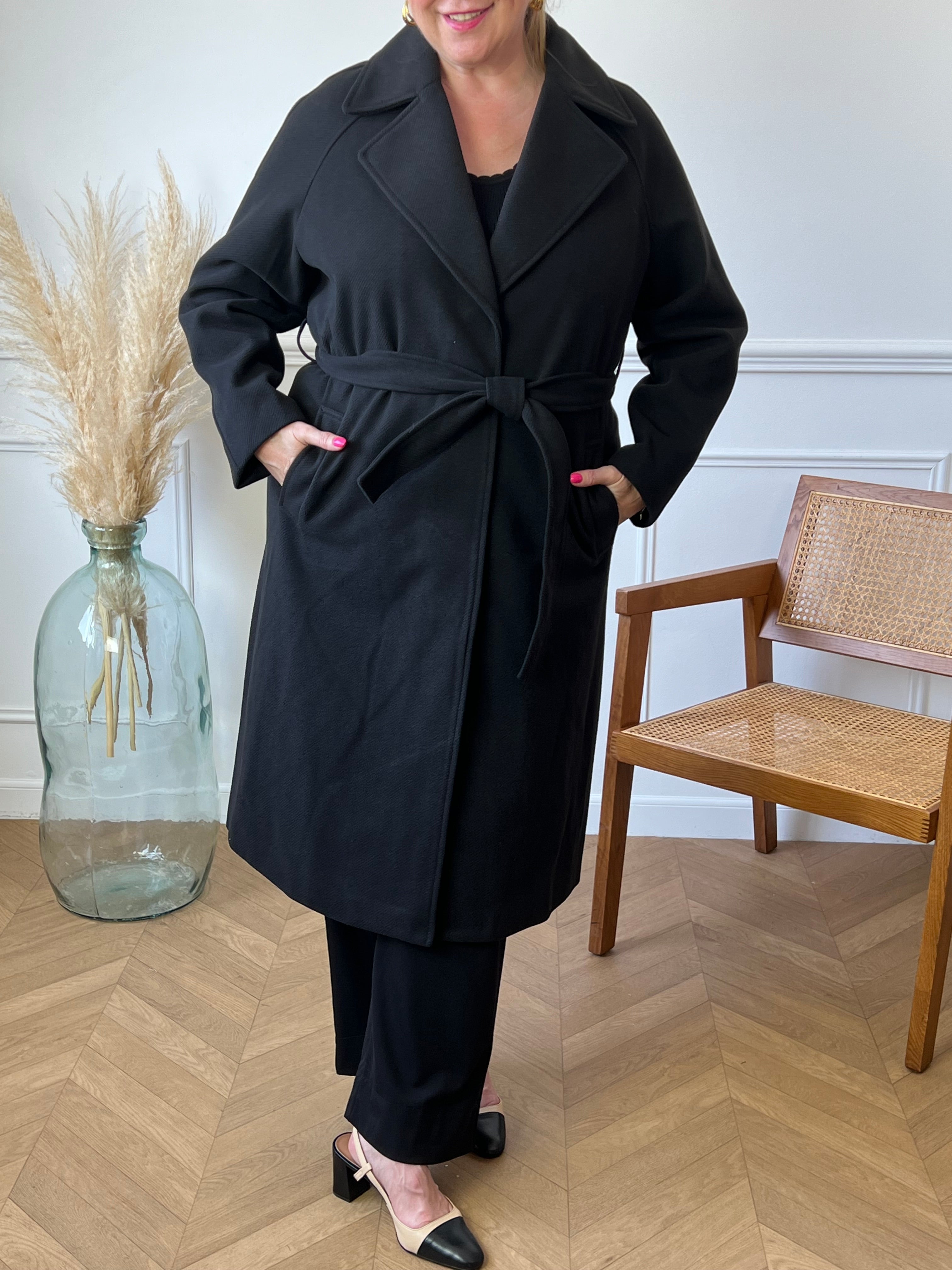 Manteau noir grande taille sale