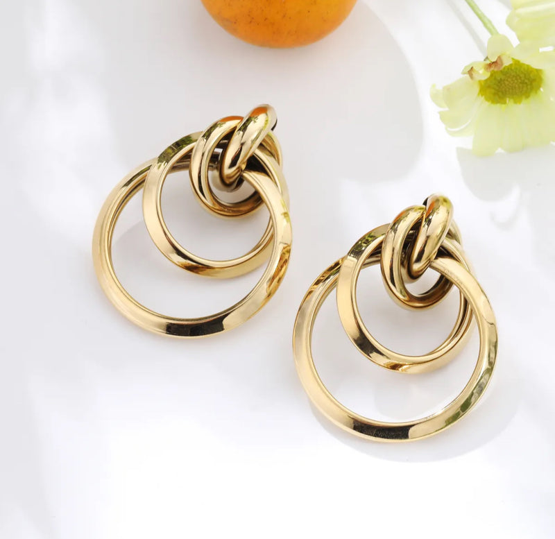 Boucles d'oreilles dorées : Musa