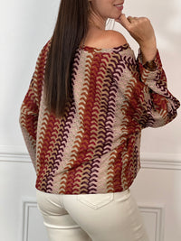 Apportez une touche de gaieté à votre garde-robe avec ce top en crochet Valentine. Conçu avec des manches longues et un col rond, il offre confort et élégance au quotidien. Sa couleur vive met en valeur votre silhouette tout en restant léger et agréable à porter.