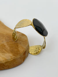 Gold and black bracelet: Julio