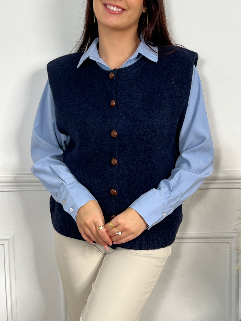 Gilet sans manches bleu marine femme
Gilet
Sans manches
Col rond
Boutons sur la longueur et les poches
Épaulettes&nbsp;
Couleur : bleu