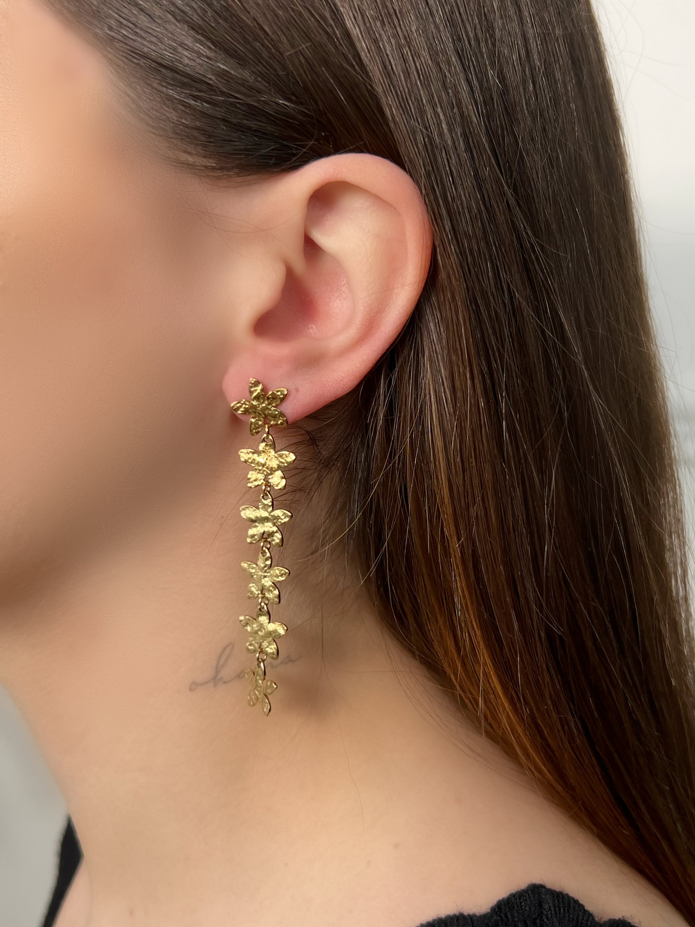 Boucles d'oreilles pendantes dorées : Fly