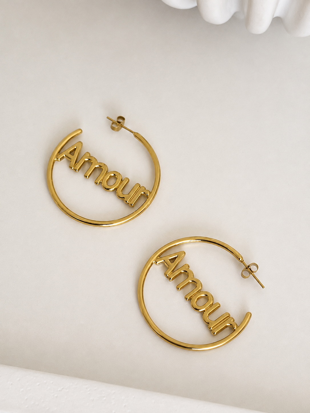 Boucles d'oreilles créoles dorées : Romance