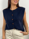 Gilet sans manches bleu marine femme
Gilet
Sans manches
Col rond
Boutons sur la longueur et les poches
Épaulettes&nbsp;
Couleur : bleu