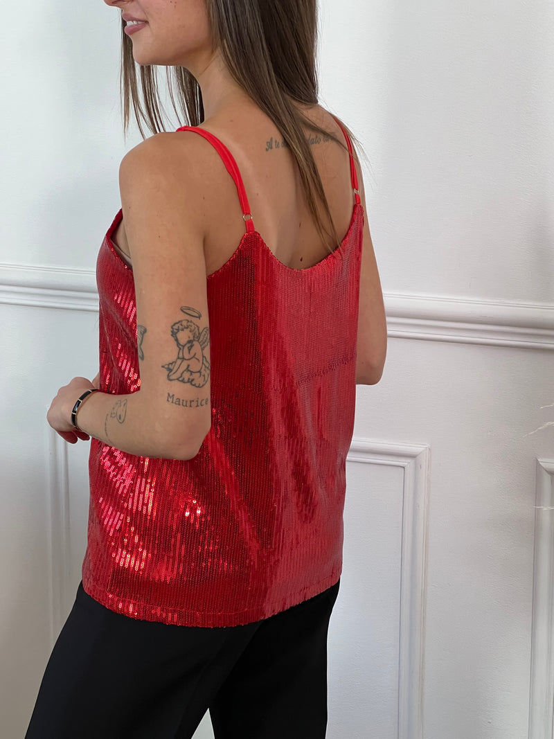 Faites resplendir votre garde-robe avec notre Top rouge à sequins Anycia ! Les bretelles réglables et le col V offrent un confort personnalisé, tandis que la doublure garantit un ajustement parfait. Les sequins rouges ajoutent une touche d'éclat à cette pièce incontournable qui vous fera briller de jour comme de nuit.