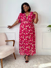 La robe Pia est parfaite pour un style décontracté et confortable. Avec ses manches courtes et son col cache coeur, elle est à la fois élégante et pratique.