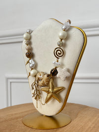 Collier doré : Ledes