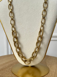 Gold necklace: Zami