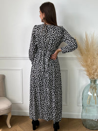 Robe longue noire avec détails Robe longue à manches longues Cache cœur Doublée sur le bas jusqu'aux genoux Elastiquée à la taille et aux poignets Couleurs : noir et écru Avec motifs blanc et doré Composition : 60% Polyester 40% Viscose Lavage à la main obligatoire Made in P.R.C