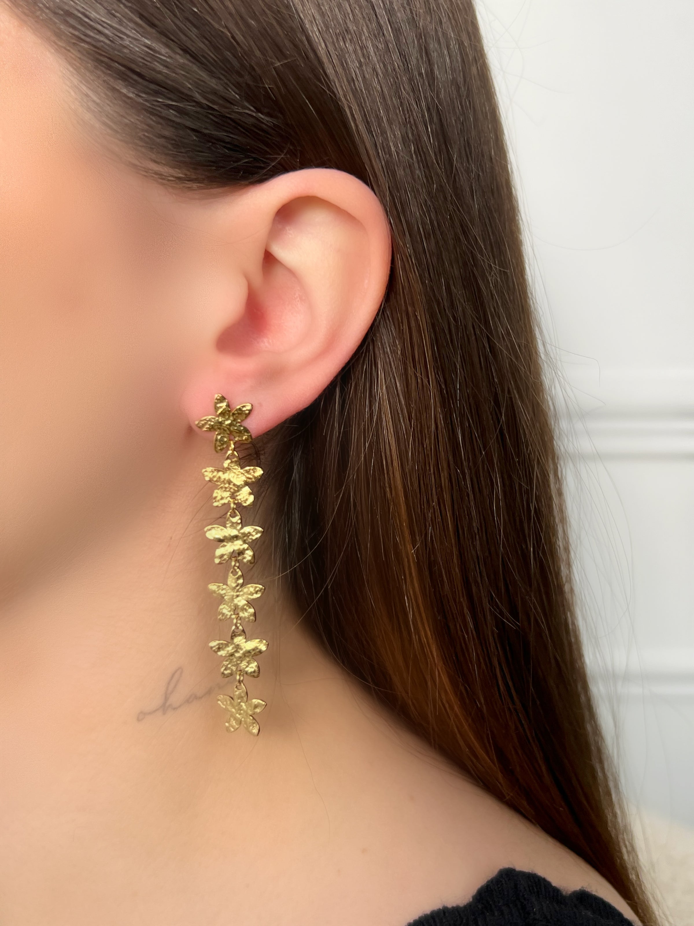 Boucles d'oreilles pendantes dorées : Fly