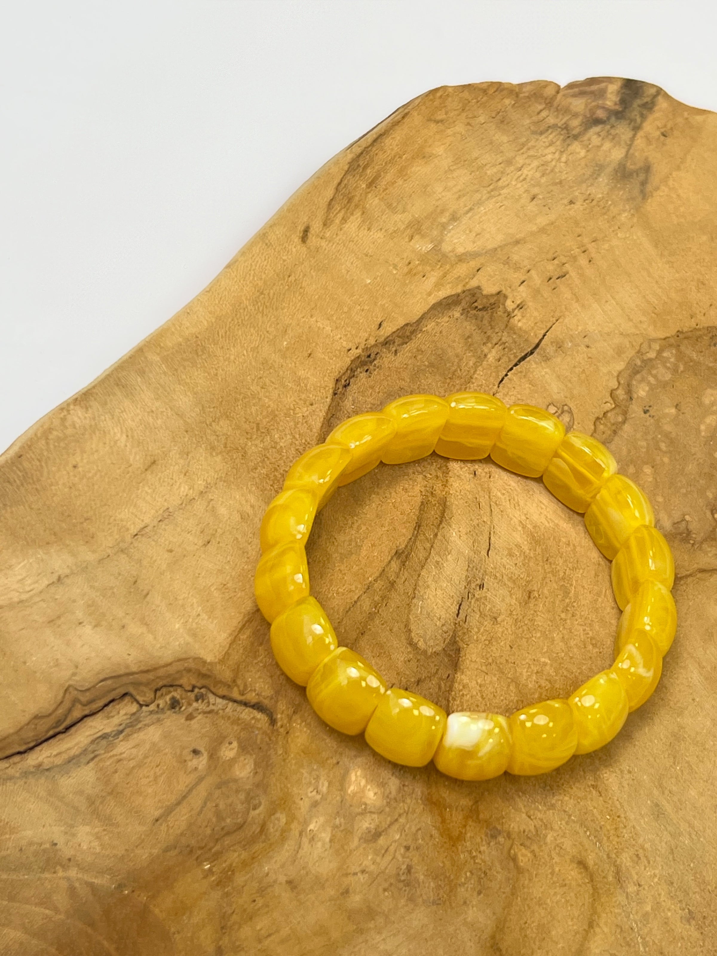 Yellow bracelet: Maya
