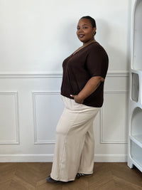 Gilet léger féminin grande taille, idéal pour compléter un look élégant.