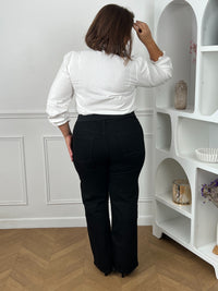 Dos pantalon noir grande taille taille haute gainante coupe large – silhouette curve de dos avec chemise blanche – Loïcia