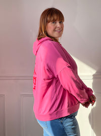 Ce sweat à capuche en coton, aussi confortable que stylé. Doté de manches longues et d’une capuche pratique, il est parfait pour un look casual au quotidien. Son inscription rouge « More amor por favor » apporte une touche tendance et pleine de bonne humeur.